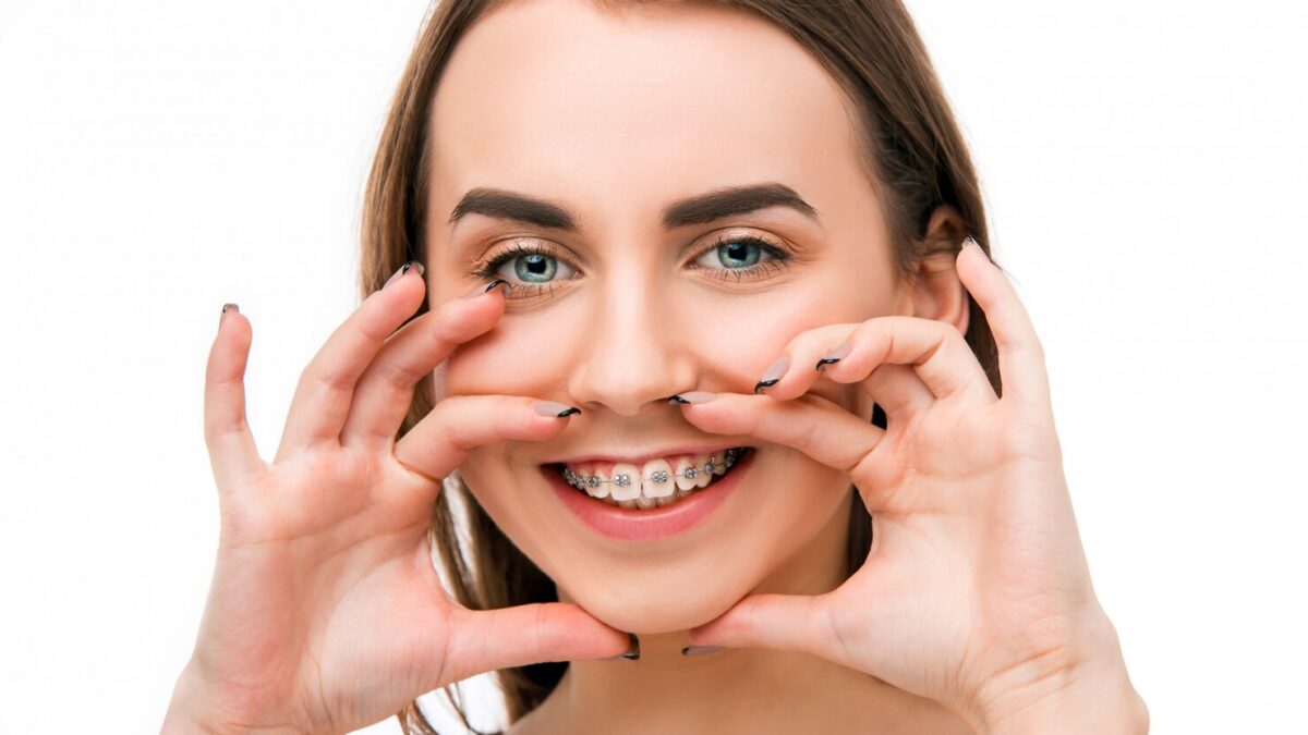 beautiful young woman with teeth braces 155003 5633